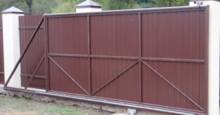 Купить откатные ворота из профнастила Снежинск, цена от 1770 руб.