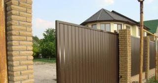 Купить откатные ворота из профнастила Снежинск, цена от 1770 руб.